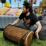 Man playing drum at festival