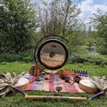 Large gong and healing tools in nature