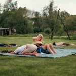breathwork ceremony in nature, woman drumming and healing