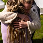 Ladies hugging at a Conscious Heart Warriors retreat