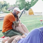 man hugging a lady during a breathwork ceremony